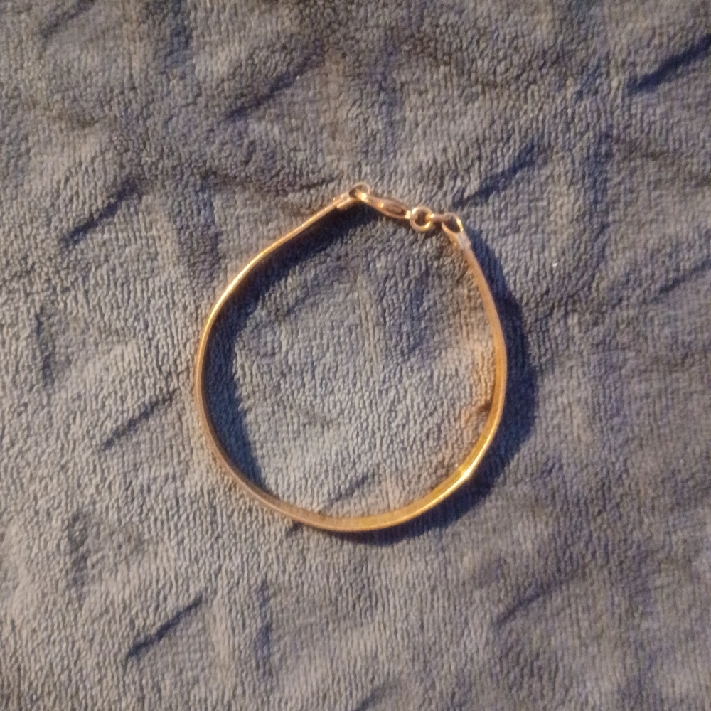 18k rose gold over stainless steel bracelet. 8 inches long. Made in Milor Italy.